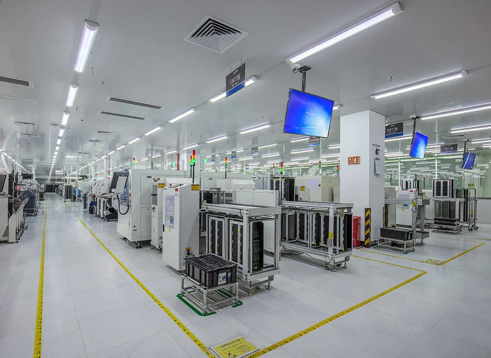 Automated electronics manufacturing lines and PCB racks inside Fenda’s SMT workshop.
